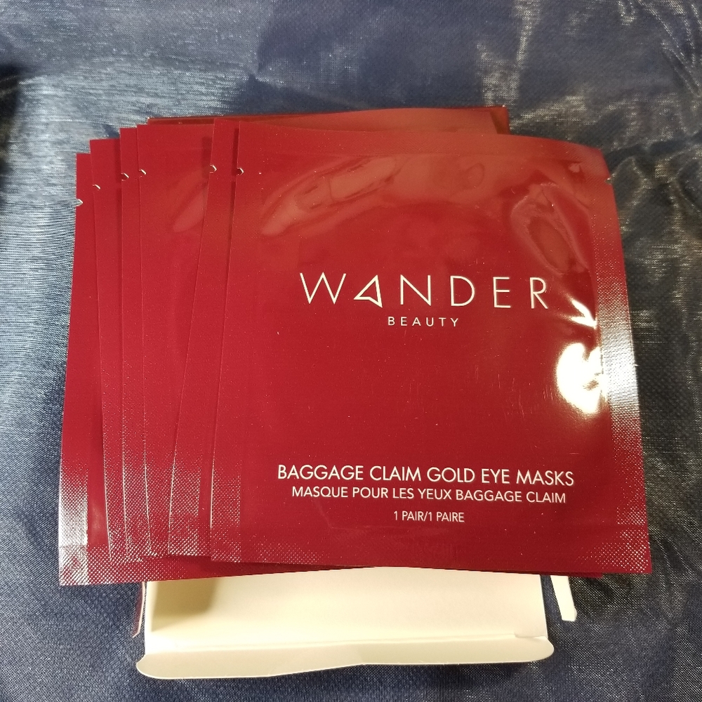 2/$30 - wander baggage claim gold eye masks
